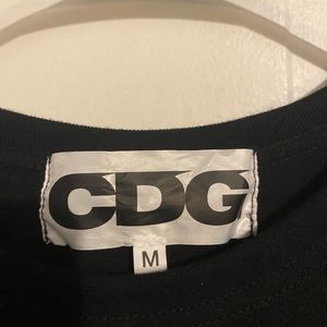 New CDG size M